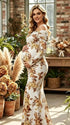 Witte zwangerschapsjurk met off shoulder design, print en elegante ruches.