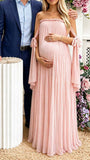 Vooraanzicht van roze babyshower zwangerschapsjurk