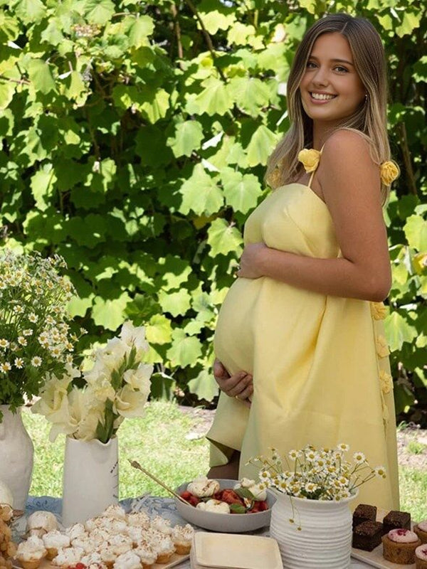Mumsmode Zwangerschaps Mini Jurk Bloemen Kwasten Trapeze Babyshower Geel