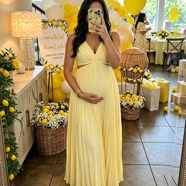 Vooraanzicht van een gele babyshower zwangerschapsjurk