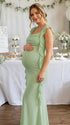 Groene zwangerschaps maxi jurk met gedrapeerde plooien.