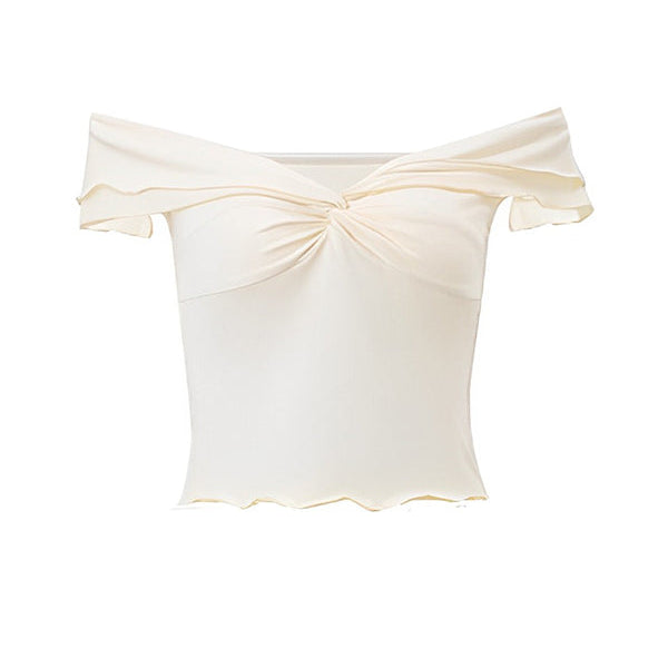 Ivoorwitte boho zwangerschaps maxi jurk met ruches en elegante details.