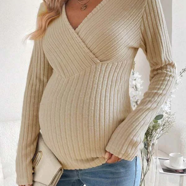 Abrikooskleurige zwangerschaps trui met gestreept patchwork design en bodycon pasvorm voor dagelijks gebruik.
