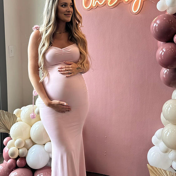 Roze zwangerschaps maxi jurk met applicaties, open rug en spaghetti bandjes voor babyshower