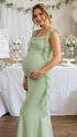 Groene zwangerschaps maxi jurk met open rug en ruches.